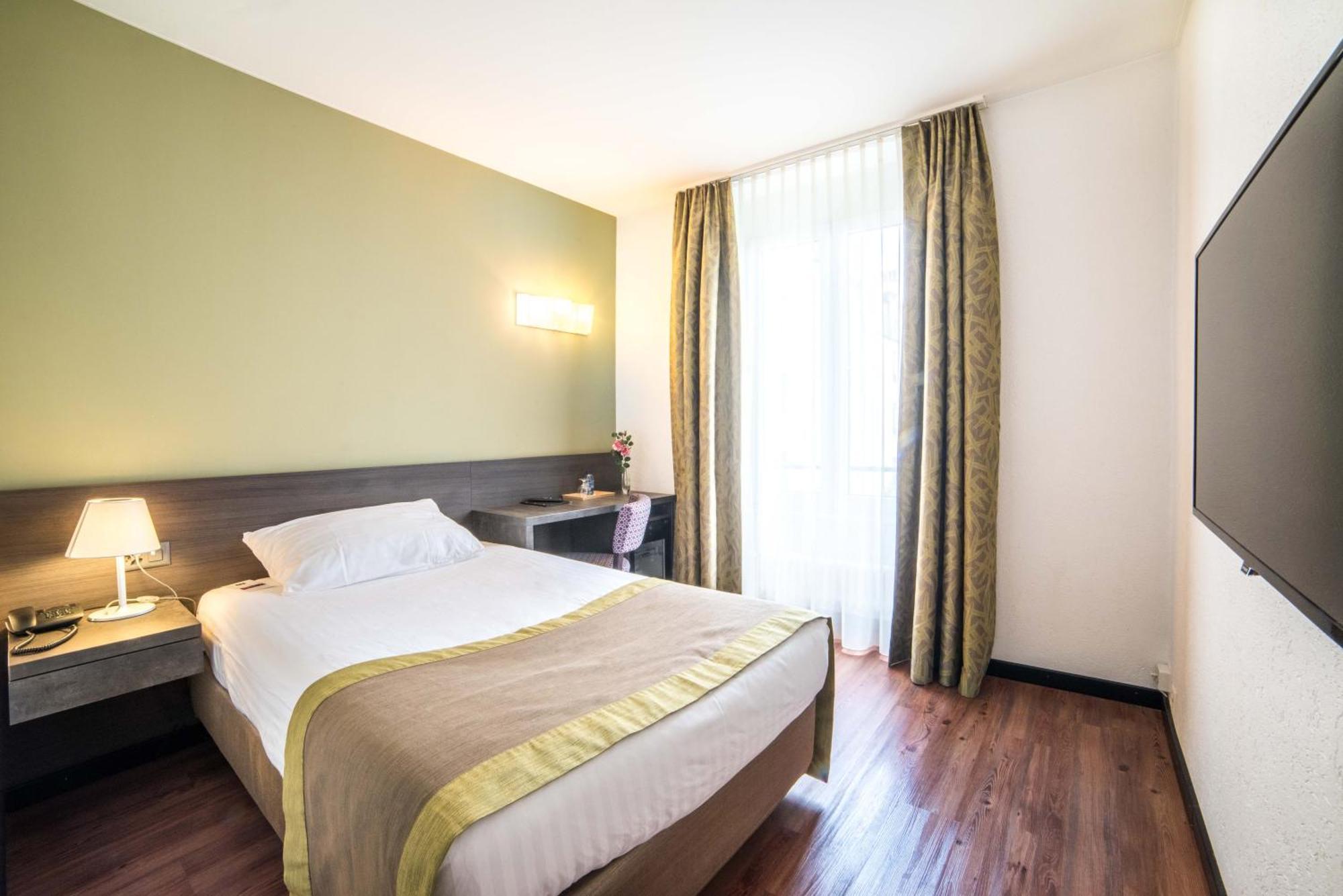 Hotel Montana Geneve Rum bild